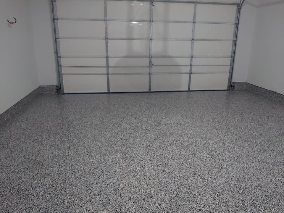 garage-floor-with-new-epoxy-finish